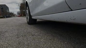 Lady driving in high heels & nylon stockings